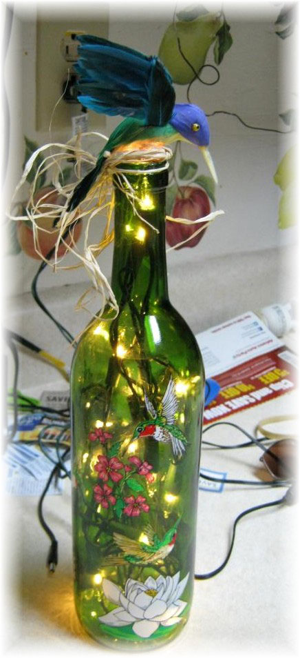 Bottle Light with Hummingbird and flowers