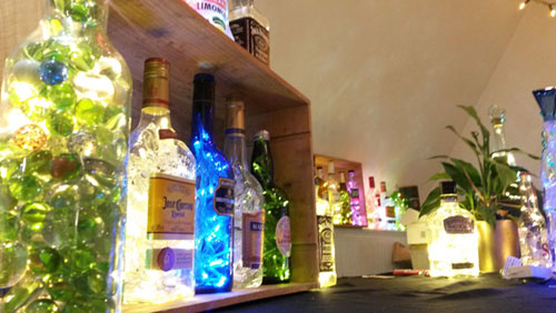 Lighted bottles on display
